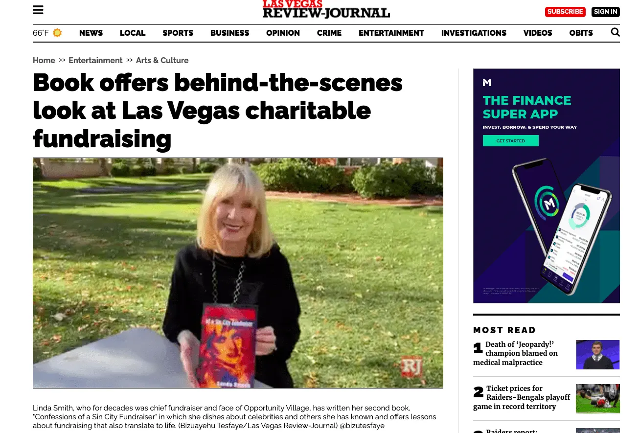 Linda Smith, a motivational speaker, holds her book "Confessions of a Sin City Fundraiser" while standing in a park, highlighting her work in nonprofit fundraising and philanthropy.| Linda’s Life – Linda Smith